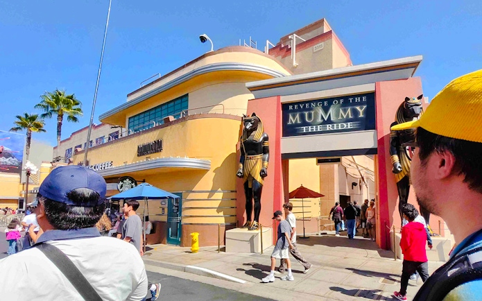 Revenge of the Mummy ride entrance at Universal Studios Hollywood with Anubis statues.
