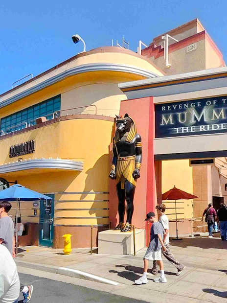 Revenge of the Mummy ride entrance at Universal Studios Hollywood with Anubis statues.