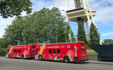 City Sightseeing bus at Seattle bus stop near Space Needle.