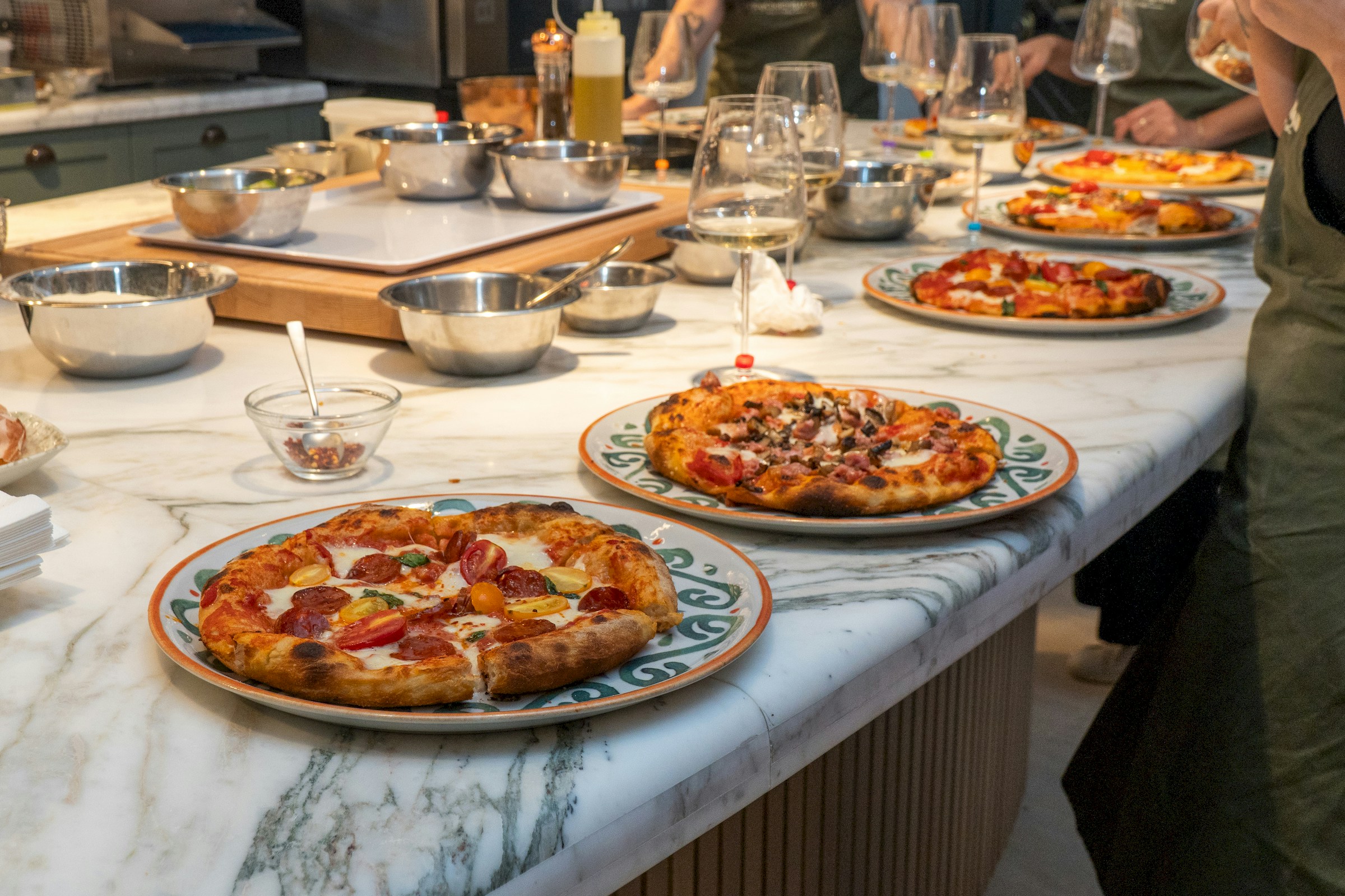 Fresh pizza on a table during a pizza-making class in Ibiza