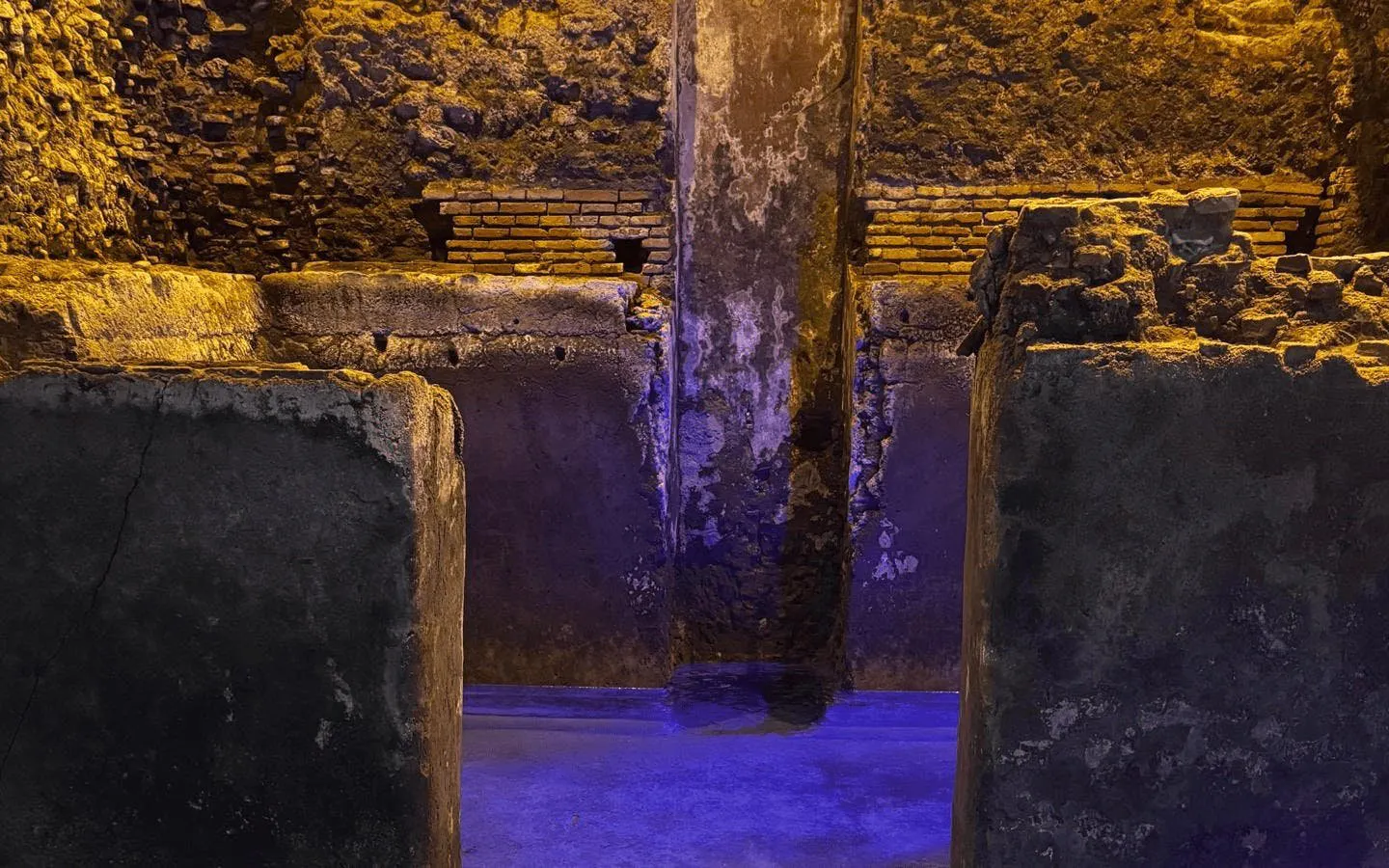 Subterranean aqueducts beneath Piazza Navona, showcasing ancient Roman architecture in Rome.