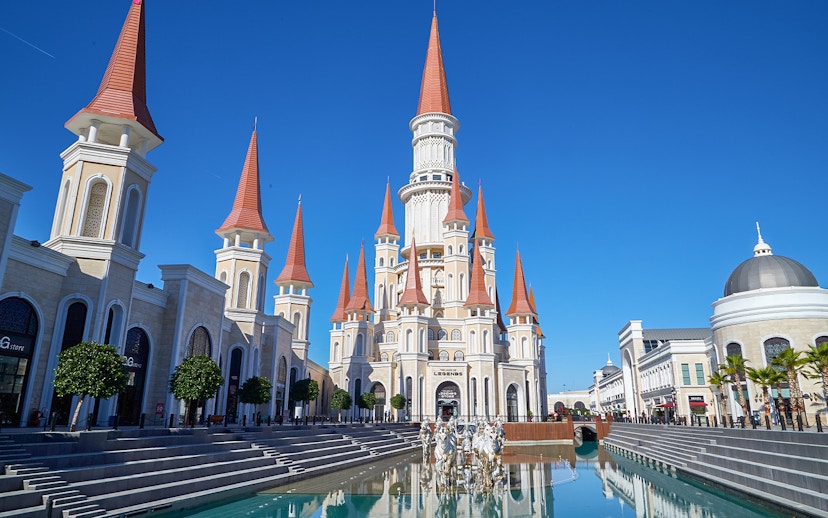 Land of Legends Theme Park castle and canal in Antalya, Turkey.