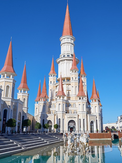 Land of Legends Theme Park castle and canal in Antalya, Turkey.