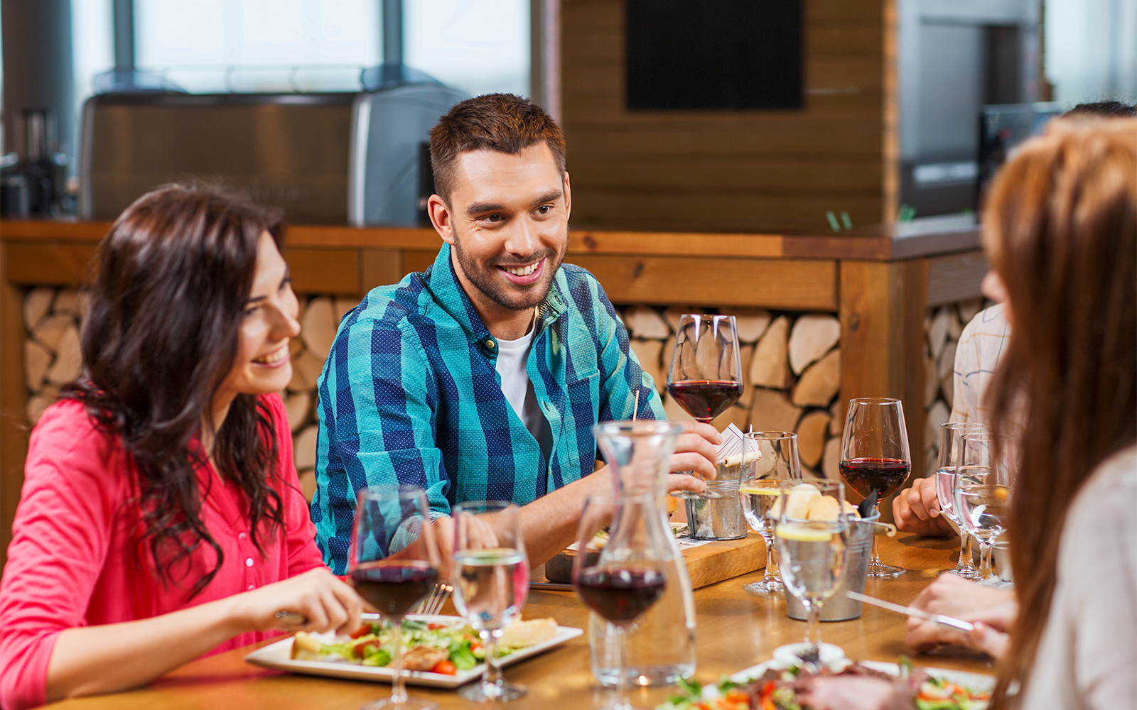 Lunch gathering at La Flottille with friends enjoying wine and food.