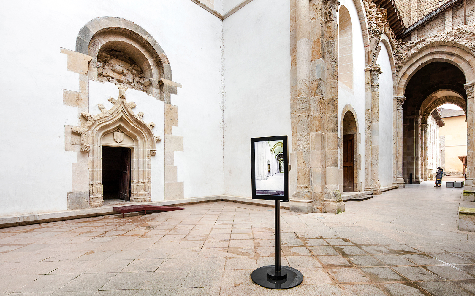 Abbaye de Cluny entrance with 3D film display, Lyon, France.