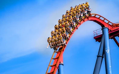 Riders on Superman: La Atracción de Acero roller coaster at Parque Warner Madrid.