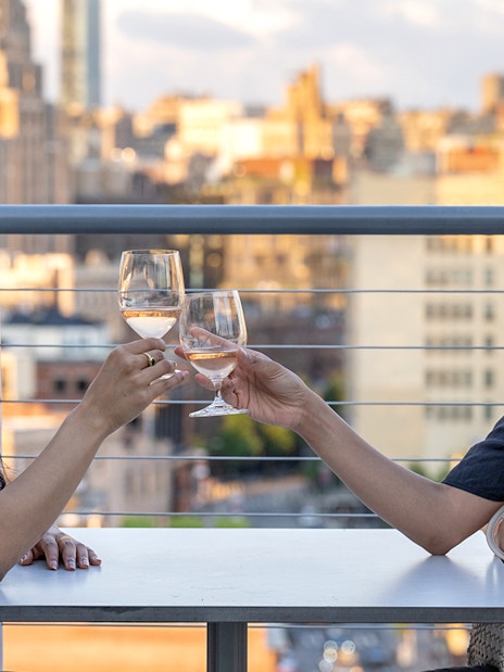 Guests enjoying drinks on the terrace of Whitney Museum of American Art.