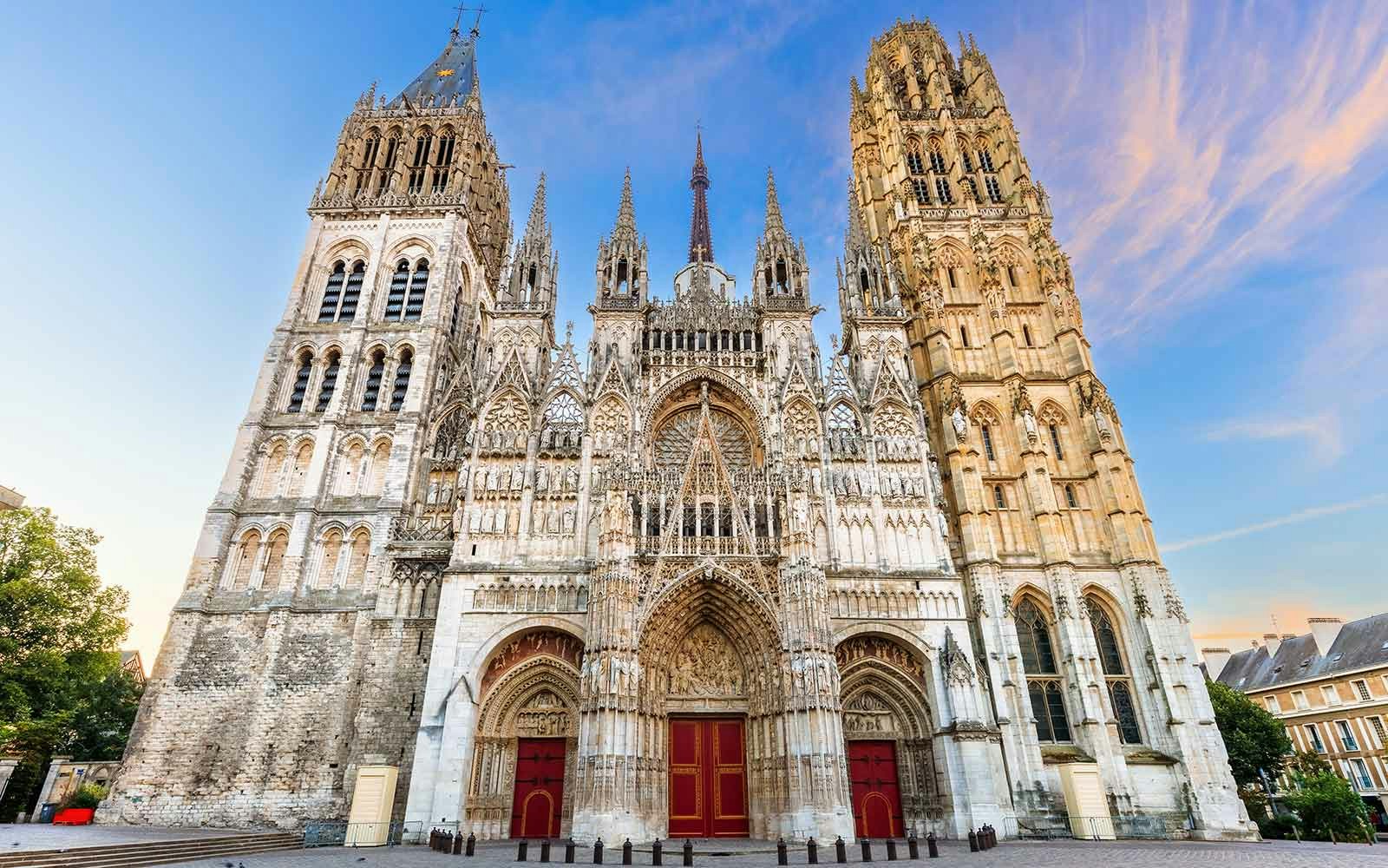Rouen Cathedral facade with intricate Gothic architecture in Rouen, France.
