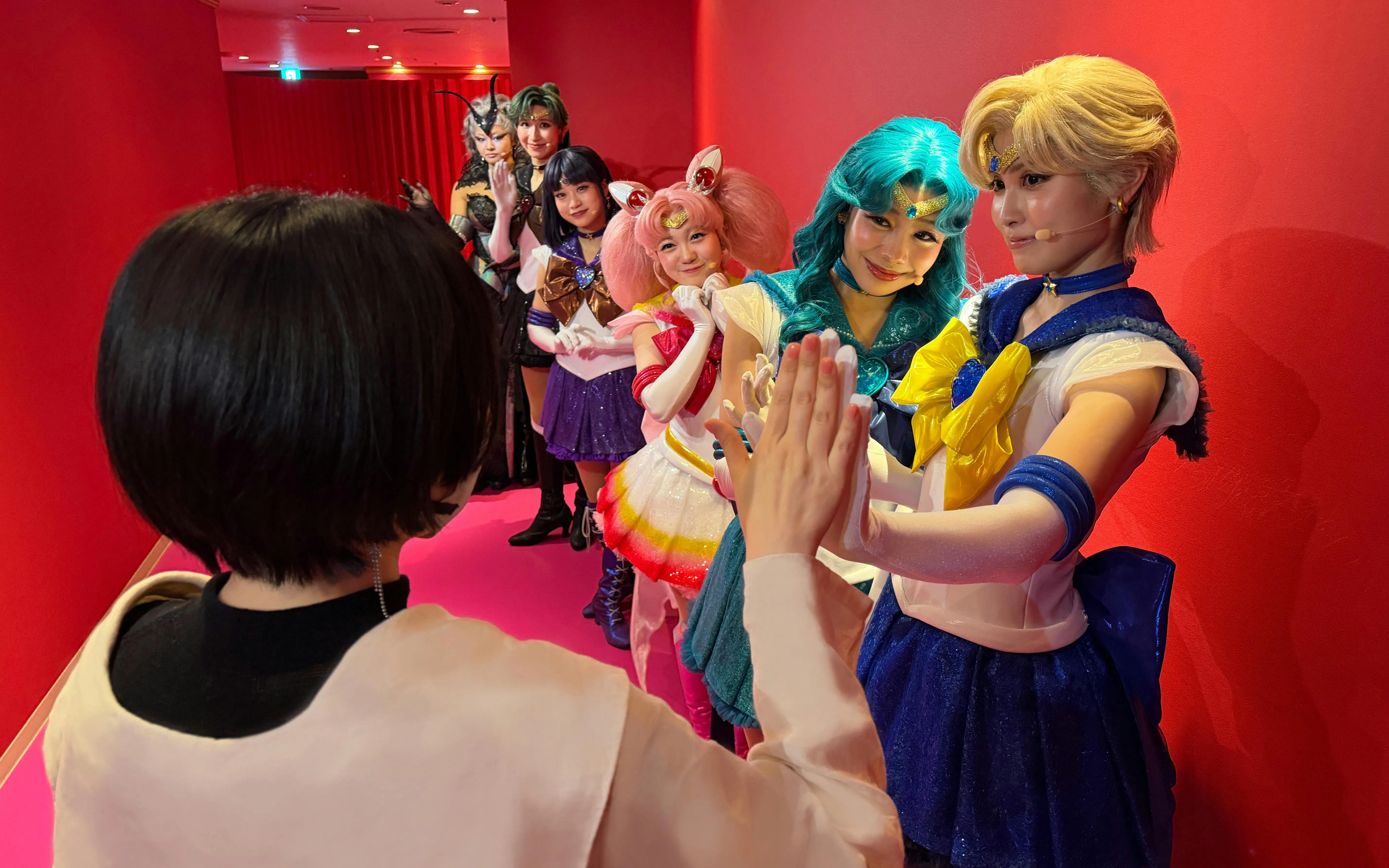 Performers in Sailor Moon costumes backstage at Shining Theater Shinagawa Tokyo.