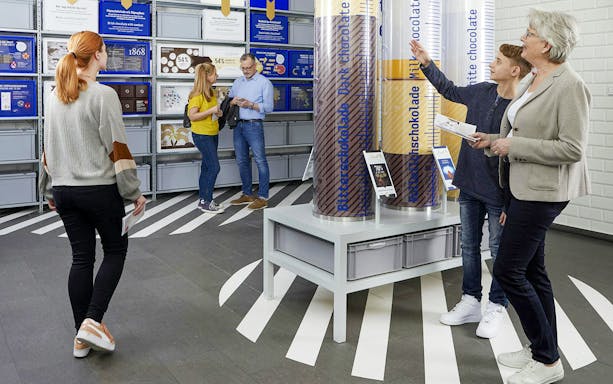 Visitors exploring exhibits at the Chocolate Museum in Cologne.
