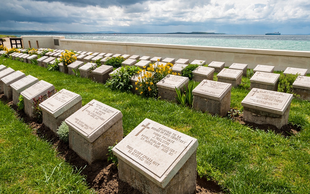 Graves at Gallipoli Peninsula cemetery overlooking the sea, part of the day tour from Istanbul.