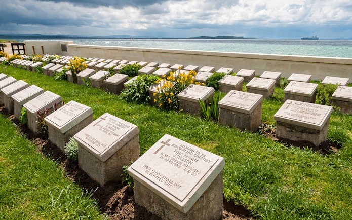 Graves at Gallipoli Peninsula cemetery overlooking the sea, part of the day tour from Istanbul.