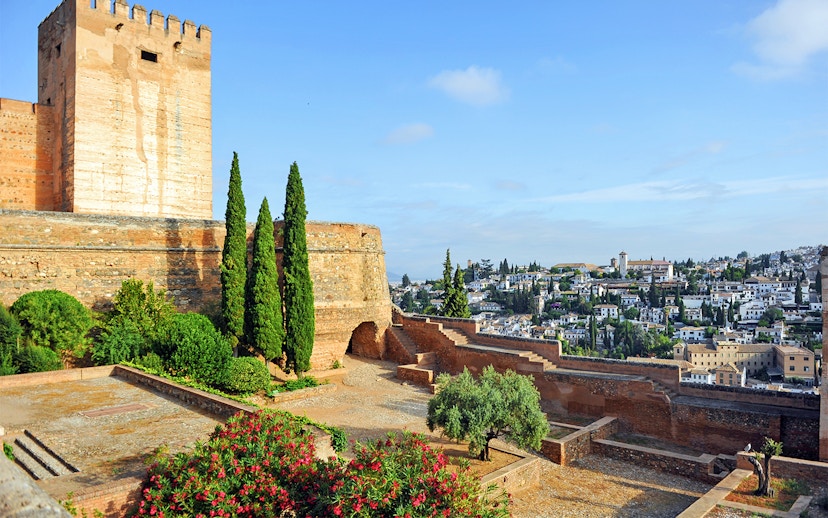 Alcazaba fortress and gardens with view of Granada, Spain.