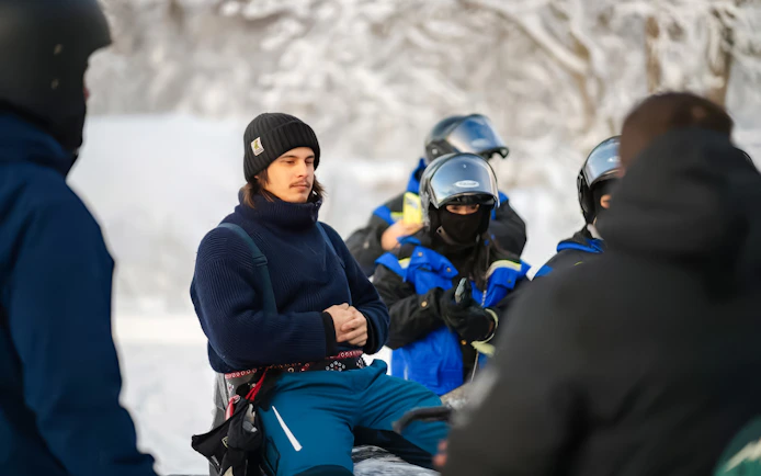 Group preparing for snowmobile ride in Tromso.