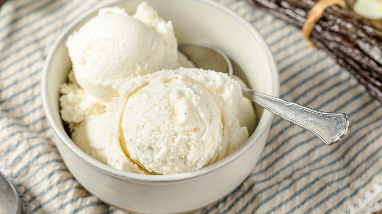 Vanilla ice cream in a bowl with a spoon, related to Moulin Rouge tour.