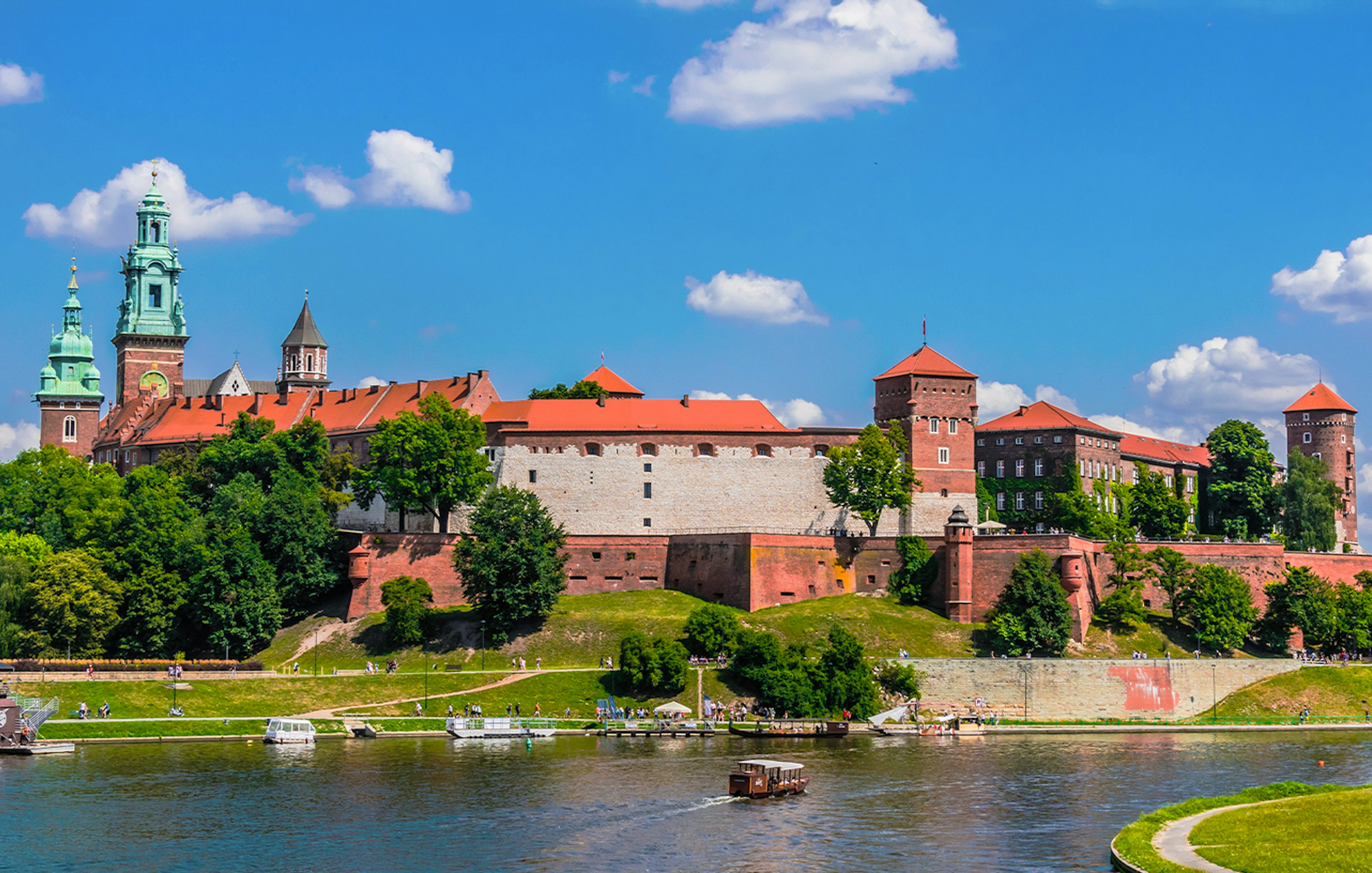 Wawel Castle viewed from the Vistula River during a sightseeing cruise in Krakow, Poland.