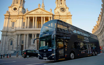 Bustronome tour bus in front of St. Paul's Cathedral, London.
