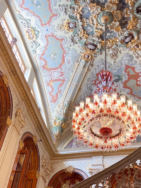 Ornate ceiling and chandelier inside Dolmabahçe Palace, Istanbul.