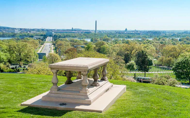 Tram tour near Arlington National Cemetery Memorial with Washington Monument in view, Washington, D.C.