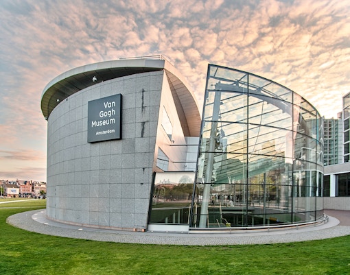 Van Gogh Museum exterior with modern glass facade in Amsterdam.