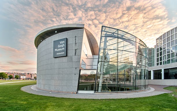 Van Gogh Museum exterior with modern glass facade in Amsterdam.