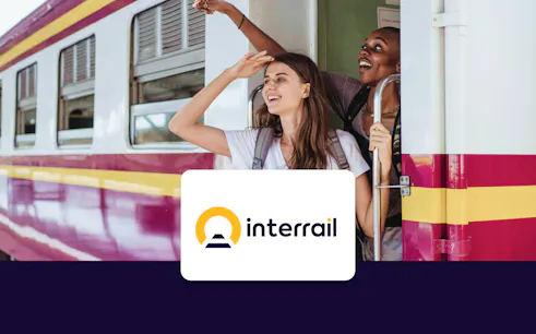 Travelers enjoying a train journey with Interrail in Europe.