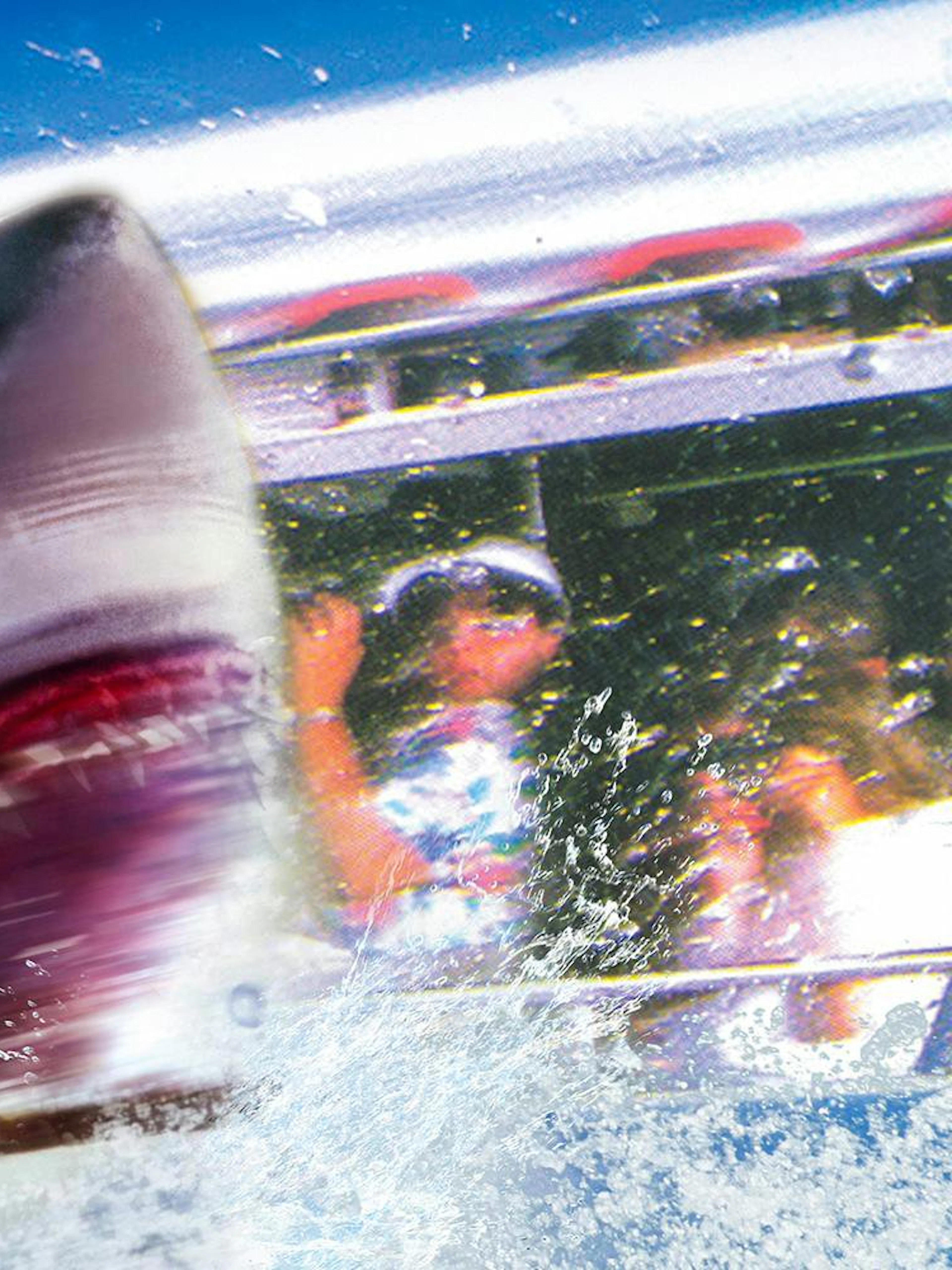Jaws ride at Universal Studios Japan with shark emerging near boat, part of Universal Express Pass 4~Race&4-D~ experience.