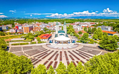 St. James Church and outdoor seating in Medjugorje, Bosnia and Herzegovina.