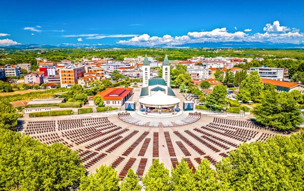 St. James Church and outdoor seating in Medjugorje, Bosnia and Herzegovina.
