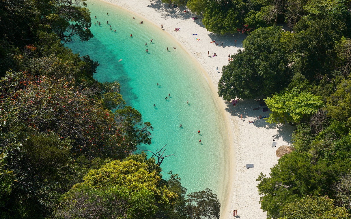Aerial view of Hong Island beach with turquoise water and lush greenery, Krabi day trip.