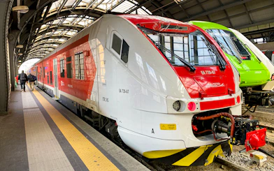 Malpensa Express train at a station platform in Milan, Italy.