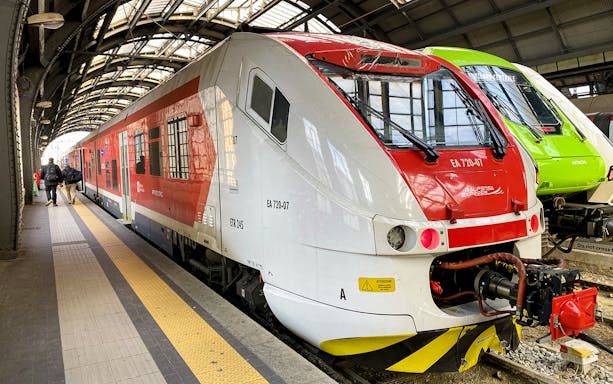 Malpensa Express train at a station platform in Milan, Italy.