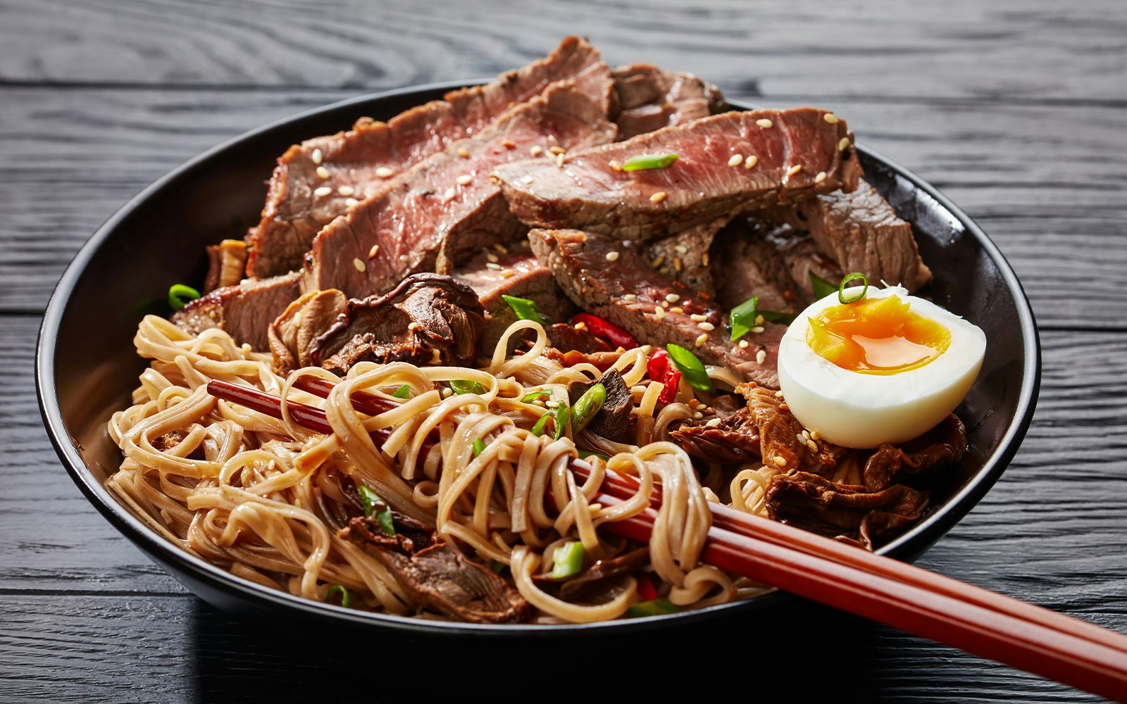 Soong Kee Beef Noodles dish with tender beef slices and noodles.