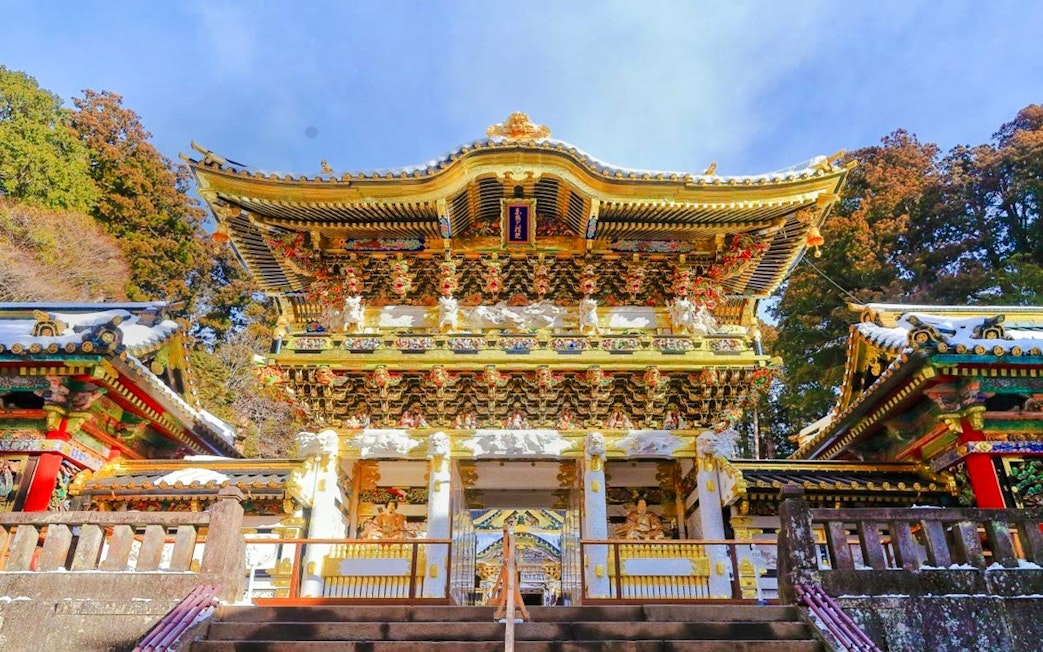 Nikko Toshogu Shrine ornate gate with intricate carvings and gold accents in Japan.