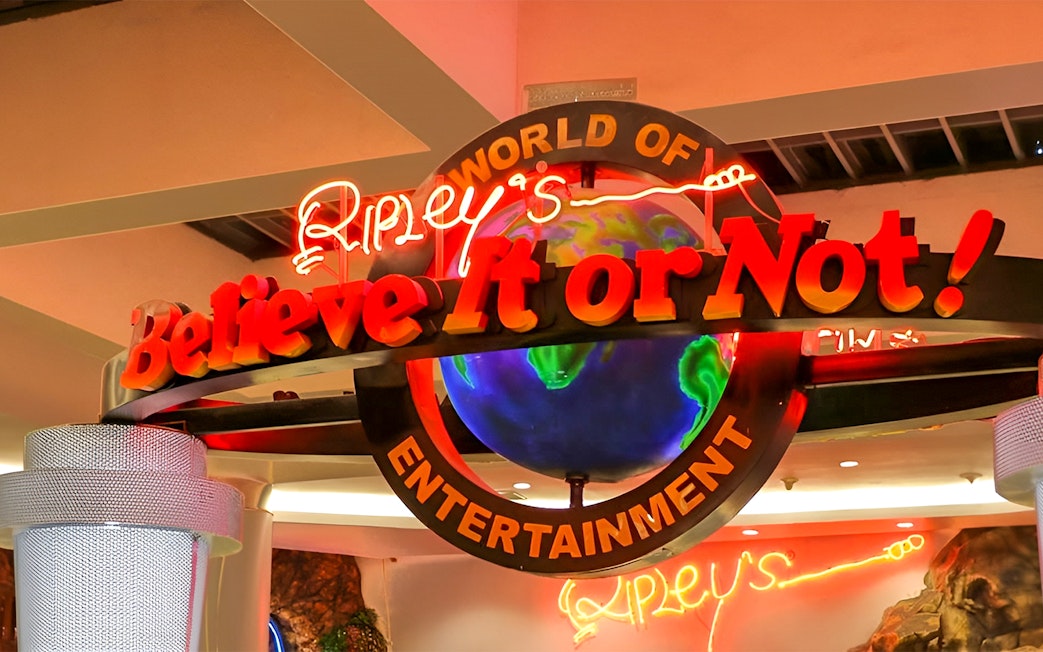 Ripley's Believe It Or Not! Museum entrance sign with neon lights and globe.