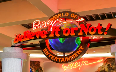 Ripley's Believe It Or Not! Museum entrance sign with neon lights and globe.