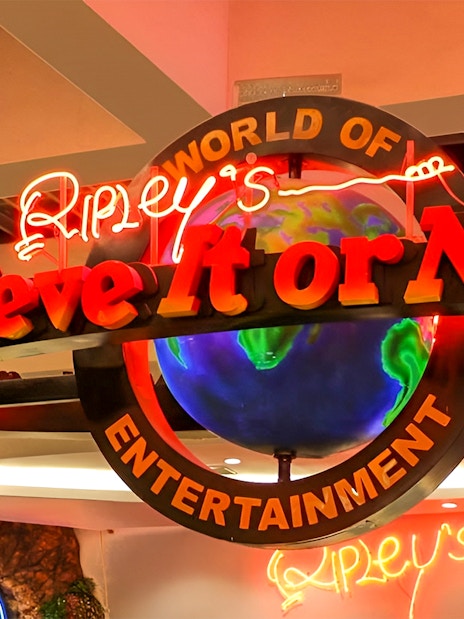 Ripley's Believe It Or Not! Museum entrance sign with neon lights and globe.