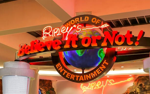 Ripley's Believe It Or Not! Museum entrance sign with neon lights and globe.