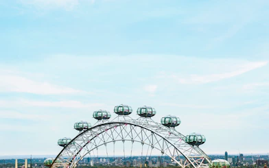 London Eye observation wheel with city skyline in the background.