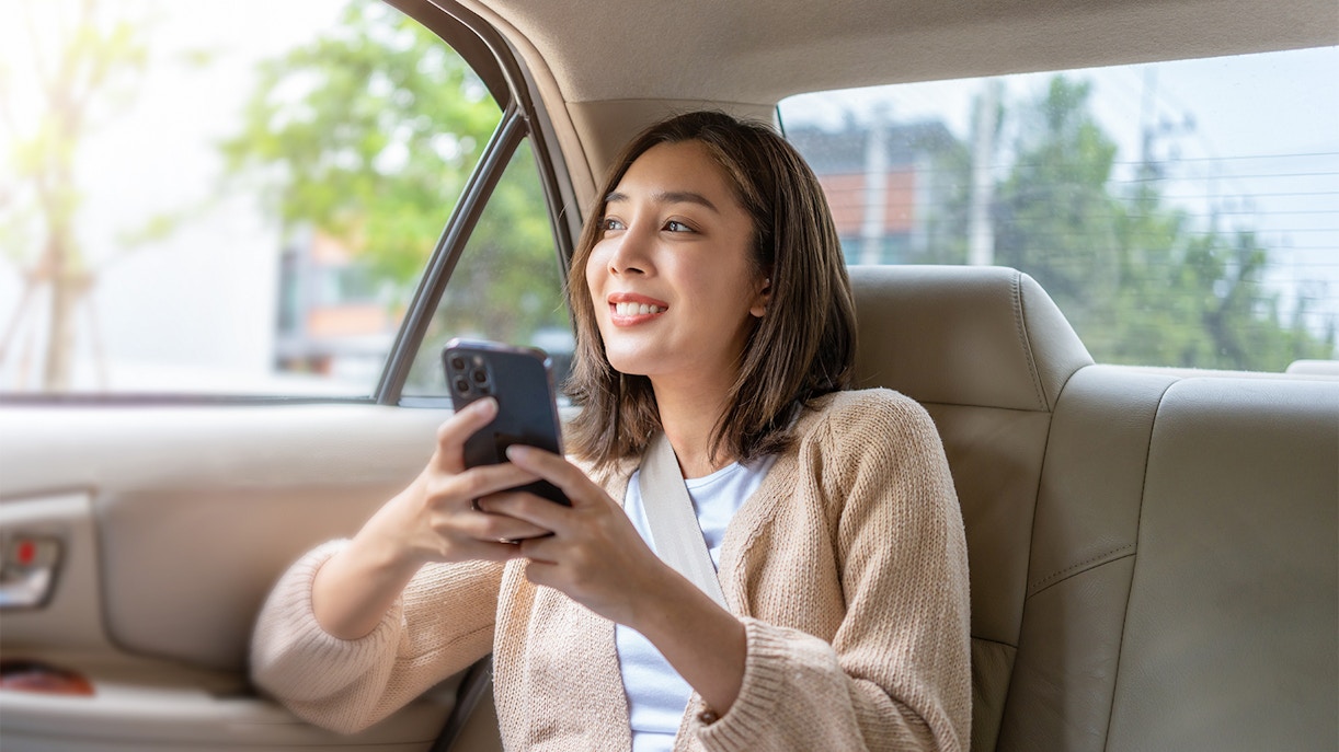 Passenger enjoying private car transfer