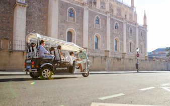 Tuk-tuk tour in Madrid passing by the Church of San Jerónimo el Real.