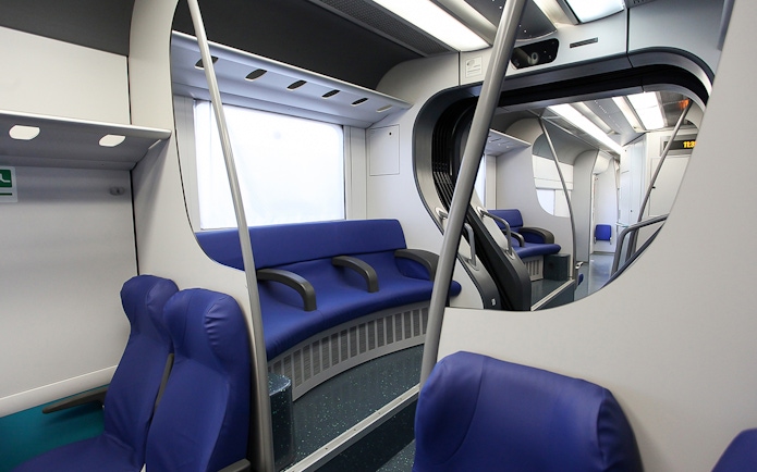 Interior of Leonardo Express train from Fiumicino Airport to Rome Termini Station.