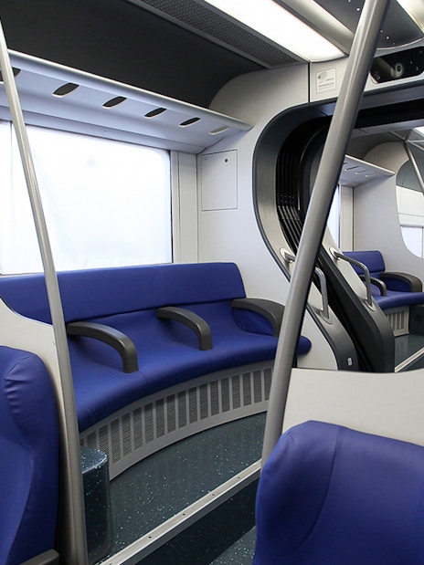 Interior of Leonardo Express train from Fiumicino Airport to Rome Termini Station.