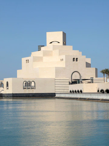 Museum of Islamic Art in Doha, Qatar, with geometric architecture by the waterfront.