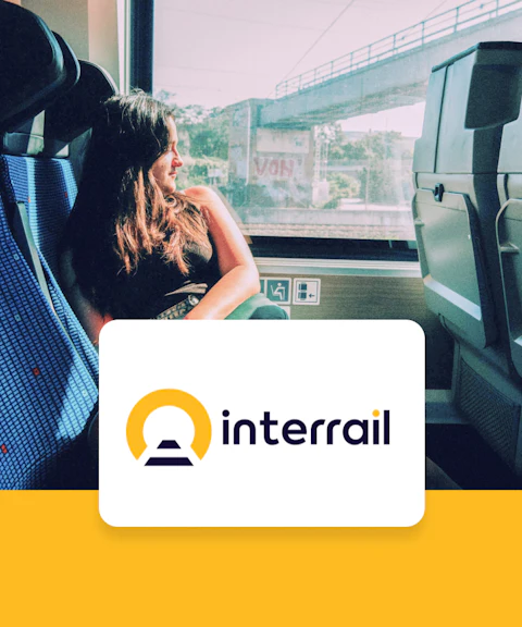 Passenger enjoying scenic view from train window, Interrail Global Continuous Pass.