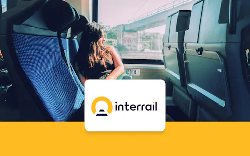 Passenger enjoying scenic view from train window, Interrail Global Continuous Pass.