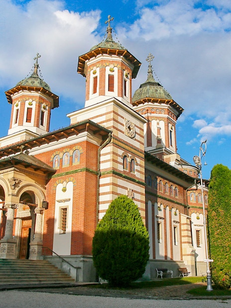 Monastery of Sinaia with Carpathian Mountains backdrop in Sinaia, Romania.