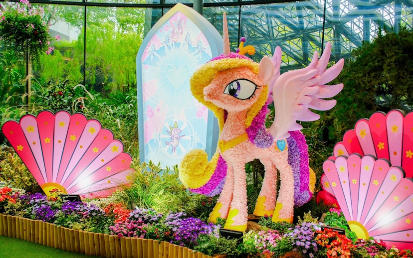 My Little Pony floral sculpture at Gardens by the Bay, Singapore, surrounded by vibrant flowers.