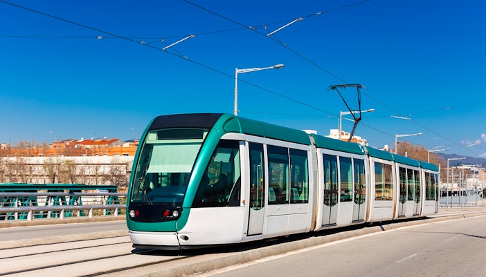 Tourists exploring Barcelona city with the Turbopass Barcelona City Card, visiting over 25 attractions and using public transport