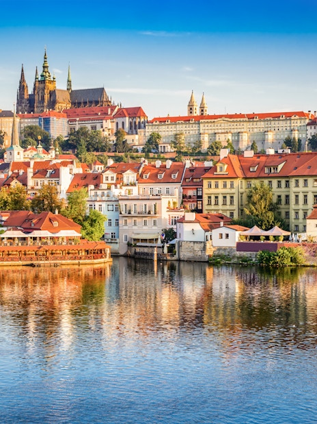 Prague Castle view from a boat on the Vltava River.
